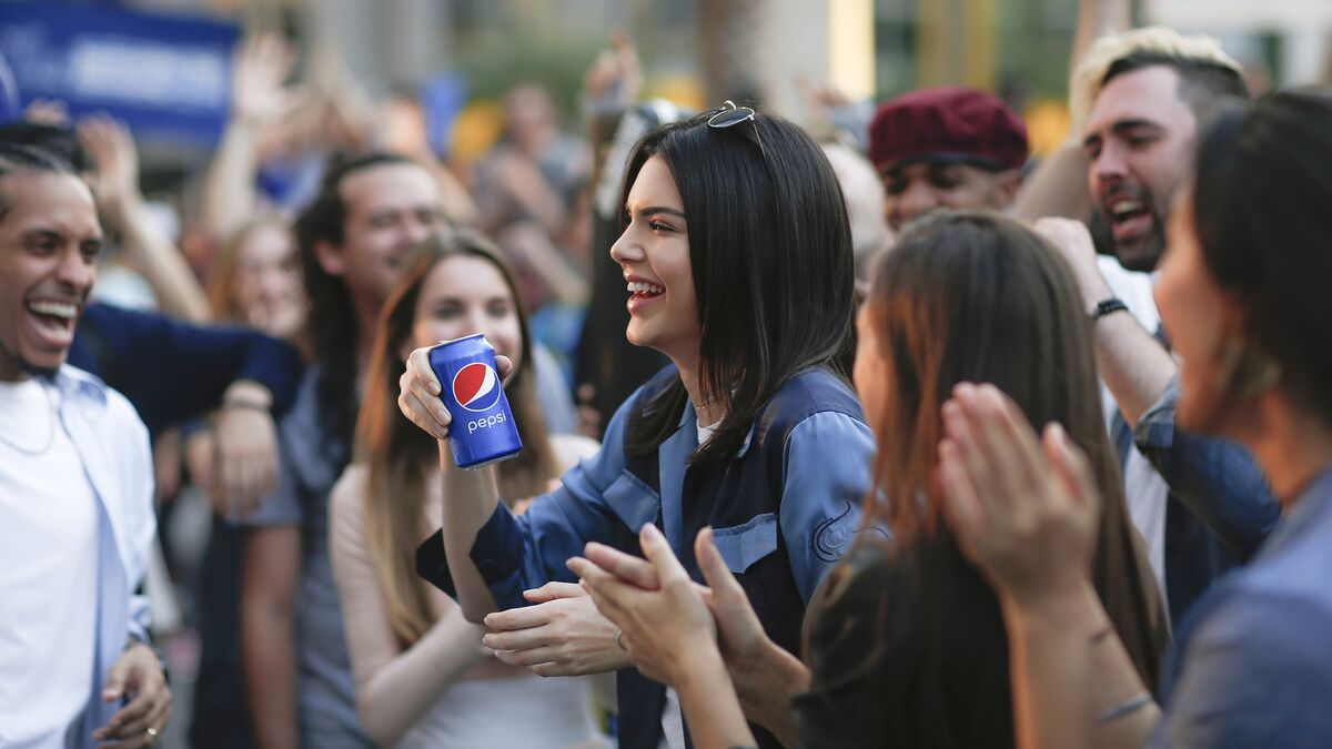 A photo of Pepsi collaboration with Kendal Jenner advertisement