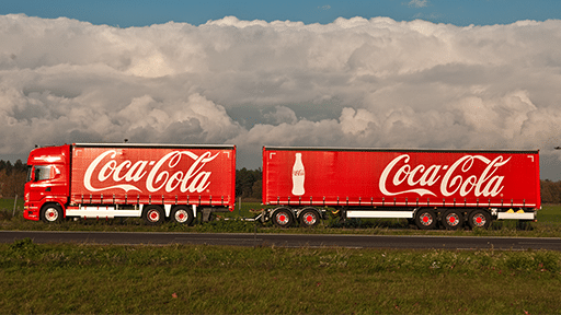 an image of coca-cola germany trucks as example of cloud crm